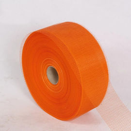 Different colors sticky and soft fiberglass mesh used for construction material on the wall