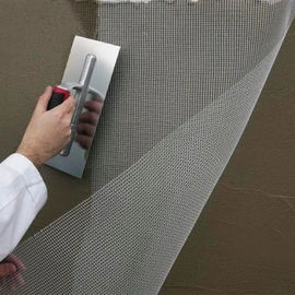 Different colors sticky fiberglass net used for construction material on the wall